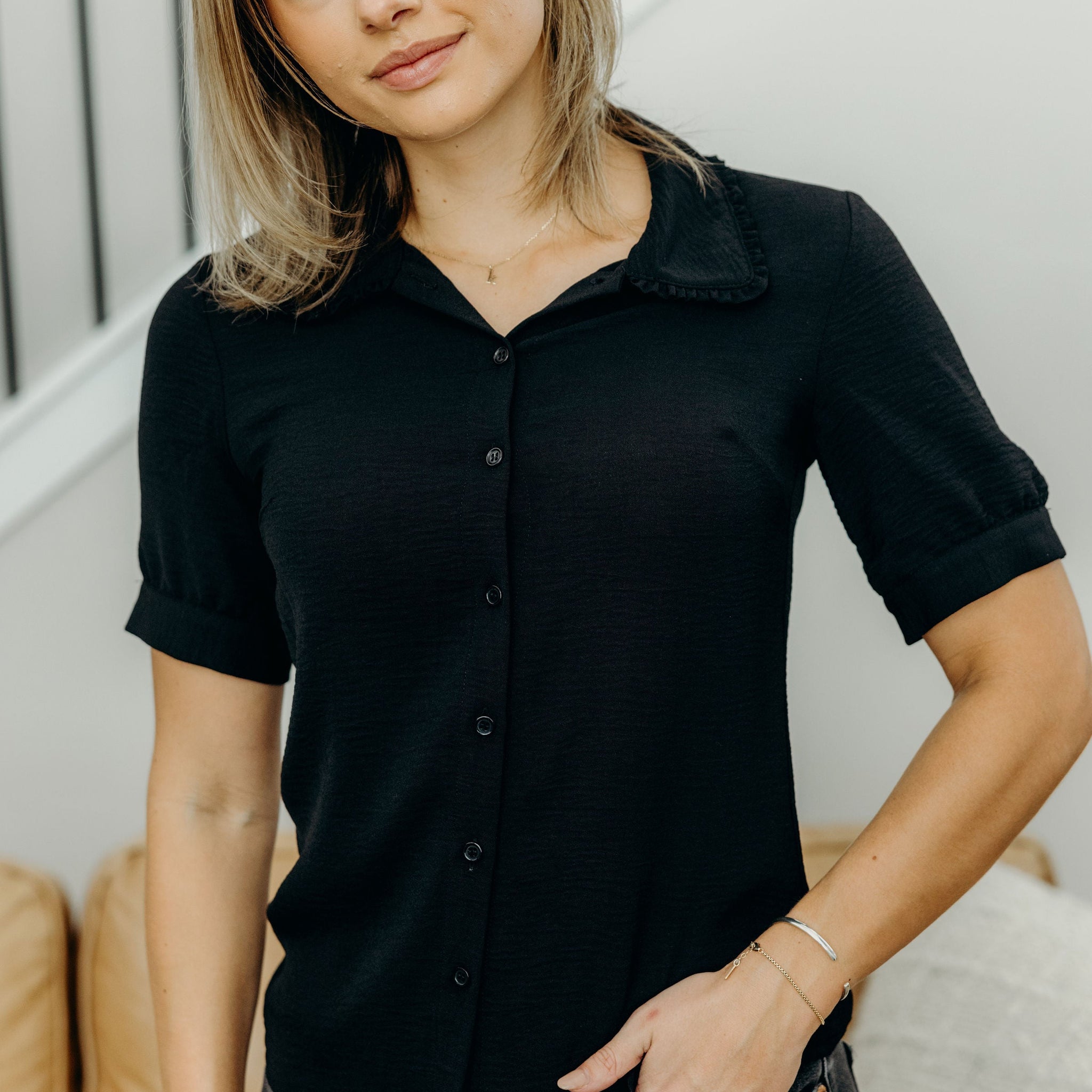 RUFFLED COLLARED BLOUSE IN BLACK