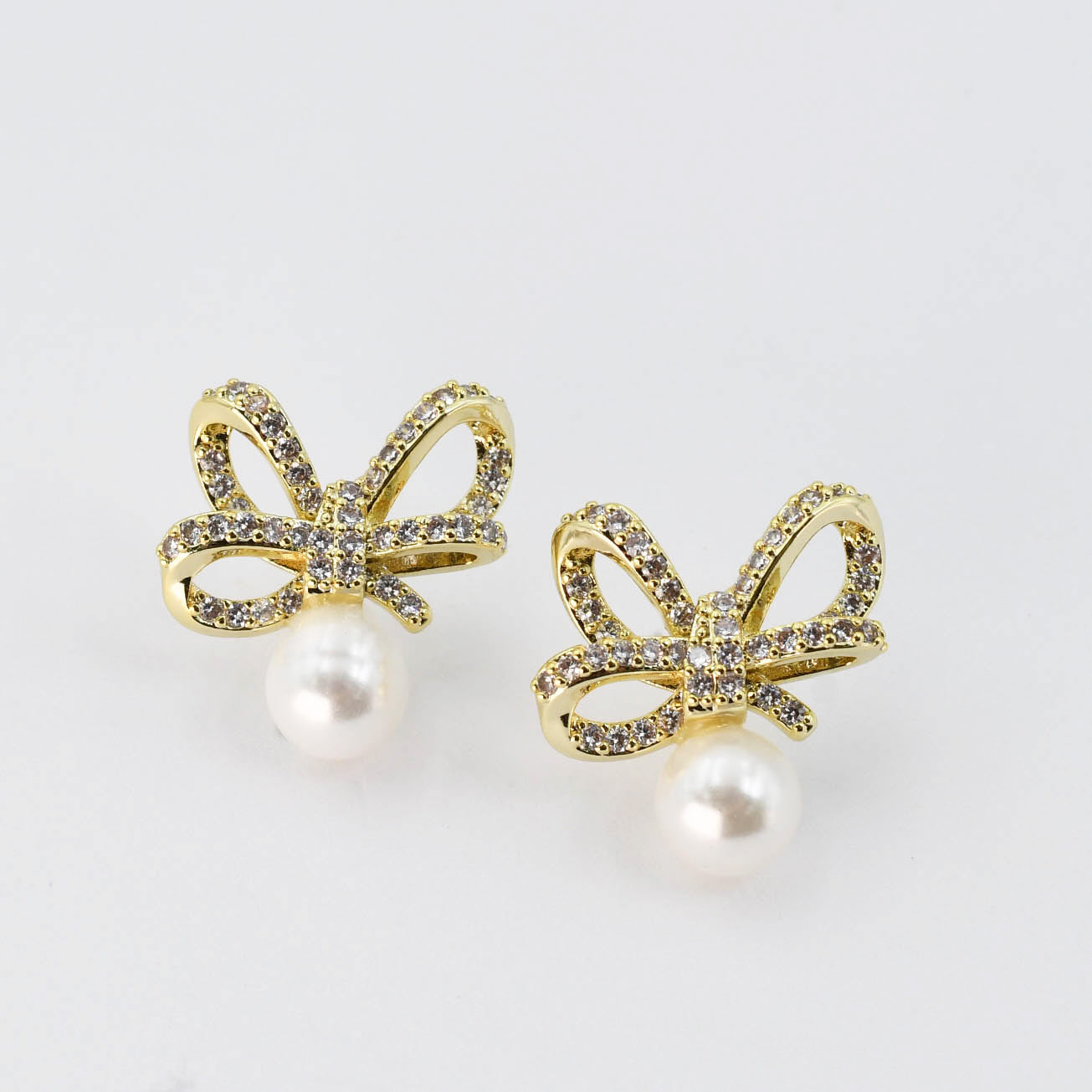 Crystal Ribbon Pearl Gold Earrings